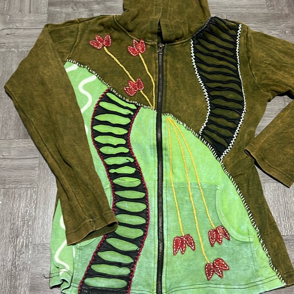 Rising international sweater